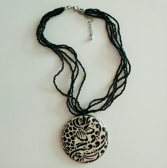 Large fish pendant beaded necklace