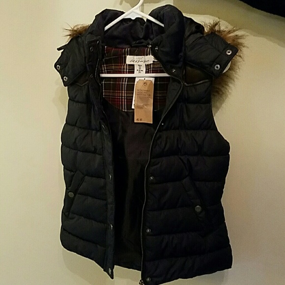 Size 6 H&M hooded vest. New, with tags. Never worn
