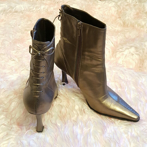 Nine West boots w/ heel and lace up detail
