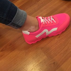 Neon pink shoes