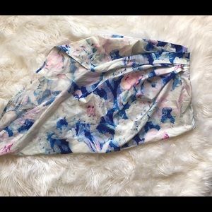 Cutest silk-like skirt. Longer on one side.