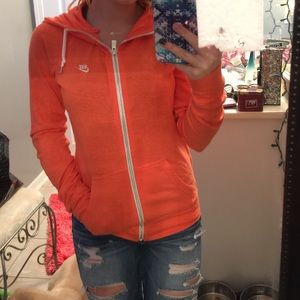 Cute light orange Nike zip up!