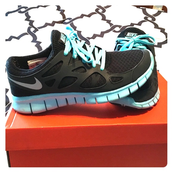 Blue and black Nike free run 2 tennis shoes