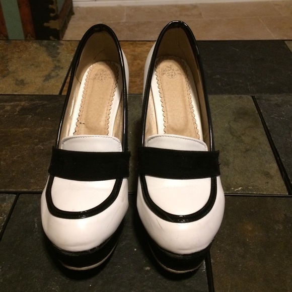 Black and white platform heels