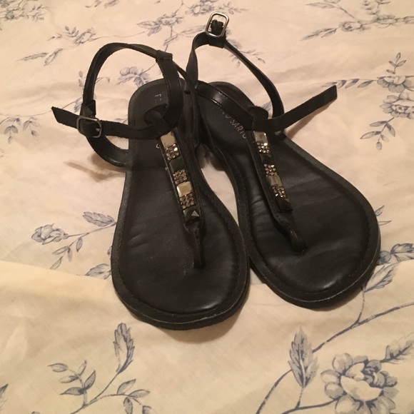 Black sandals with silver, black and white gems.