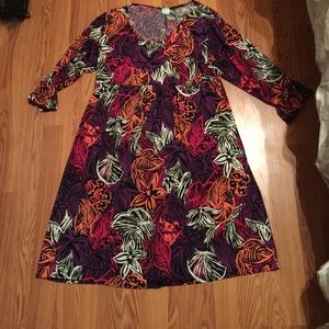 Multi-color dress with 3/4 sleeves, mid-calf.