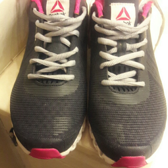 Navy blue pink and white Reeboks