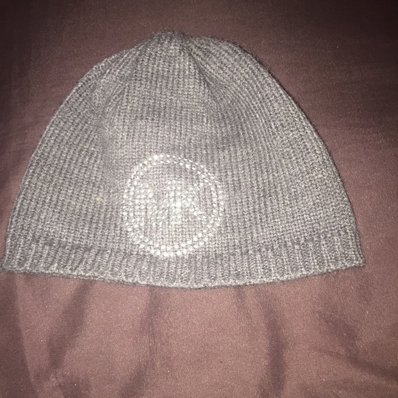 Michael Kors hat worn once color Grey w/silver