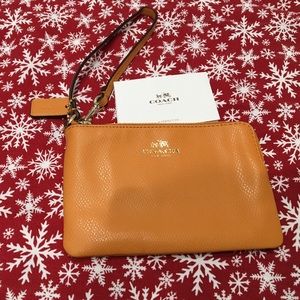 Coach zip wristlet.