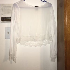 this looks very cute with ripped jeans and wedges