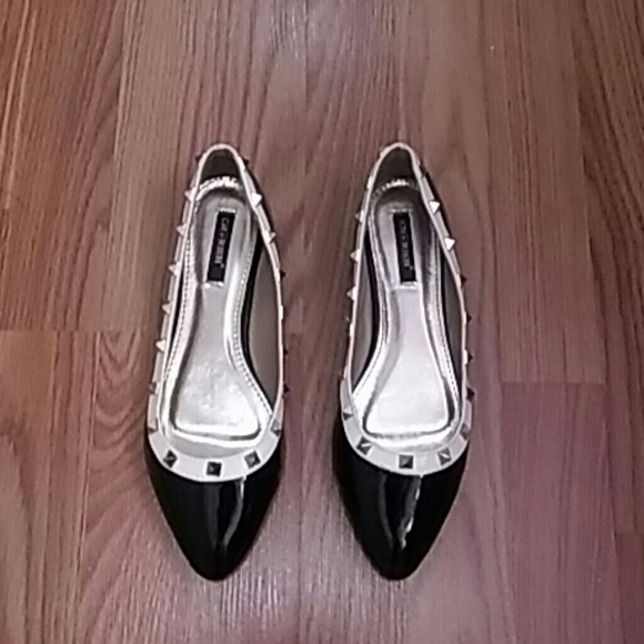 Black and beige studded shoes