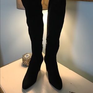 Over the knee boots by Ivanka Trump