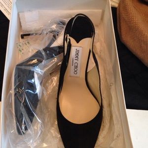 Never worn suede, jimmy choo shoe.