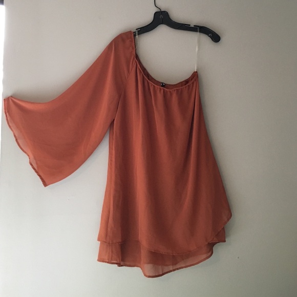 Swell tunic with one bell sleeve & layered detail