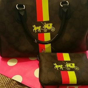 Authentic limit edition 2014 coach and wristlet..