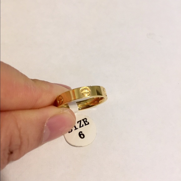 Stainless Steel Love Ring Size 6 silver and gold - Picture 1 of 2