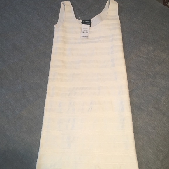 Brand new Bebe cream tank dress