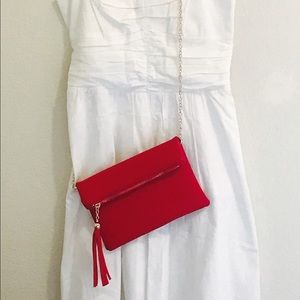 Little red bag with tassel detail.
