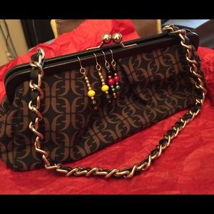 Fossil small handbag black and brown print.