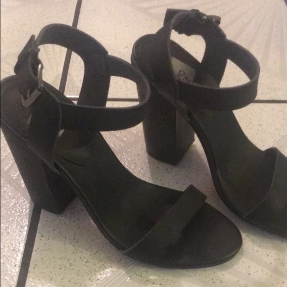 We Who See black block heels.