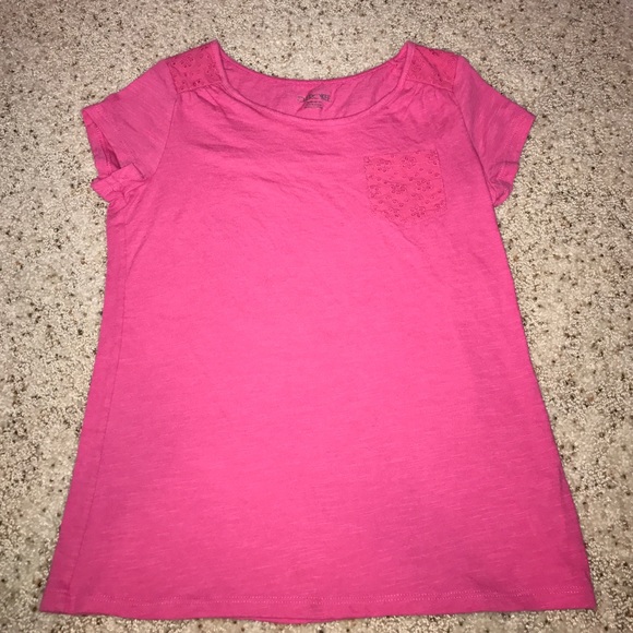 girls pink pocket tee with floral cutouts