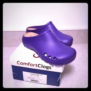 BRAND NEW purple clogs. Cutout ventilation sides