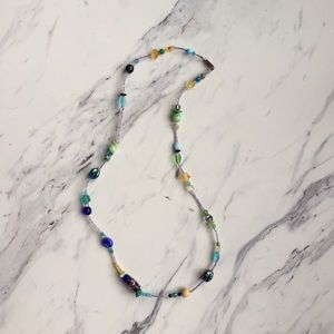 Blue beaded necklace.