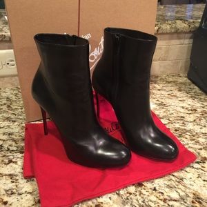 Size 8.5 Christian Louboutin boots. Worn once.