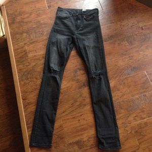 High waisted black ripped skinny jeans