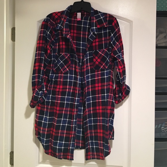 Plaid button down shirt.