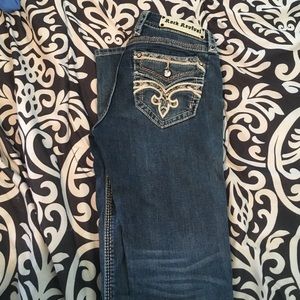 Never worn rock revival jeans!