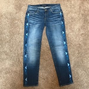 Driftwood distressed/embroidered skinny jean