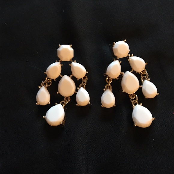 White and gold statement earrings