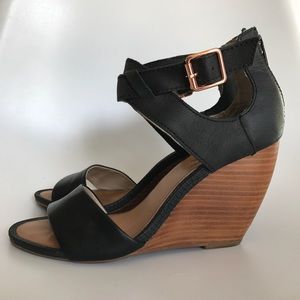 Spring black leather wedges with wood bottom!
