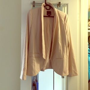 Trouvé dress coat in nude pink color.