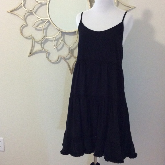 Fun, fun, fun. Flouncy spaghetti strap LBD.
