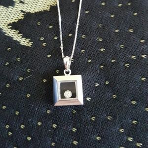 14K White Gold w/Floating Diamond