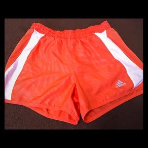 Size small orange Addidas running short