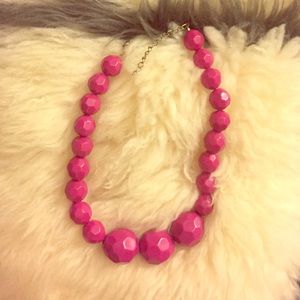 Pink geometric statement necklace