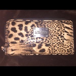 Kenneth Cole Reaction leopard wallet newer cond.