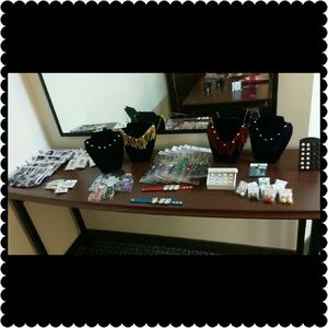 NECKLACE. LIPSTICK. MAKE-UP BAGS. EAR RINGS.