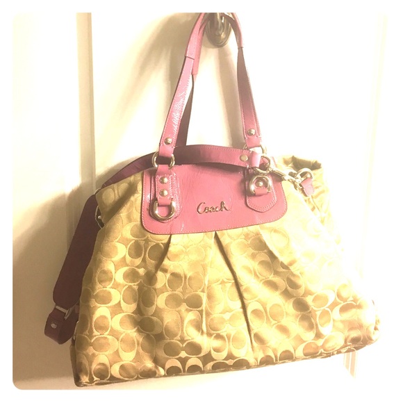 Coach handbag pink handles and interior