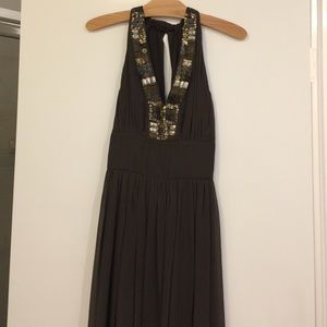 Maxi silk sun dress with elaborate neckline.