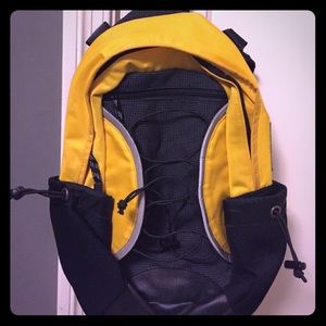 Yonex yellow and black cross body backpack