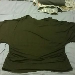 Black shirt with roushing on both sides