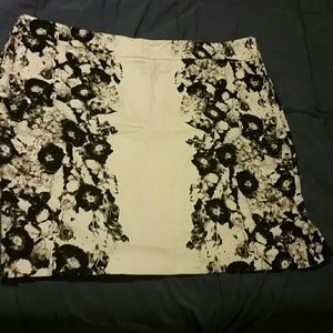 White with black floral skirt