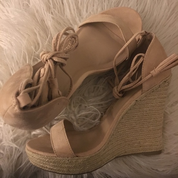 Cream wedge sandals with ankle ties