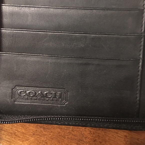 Coach leather refillable planner.