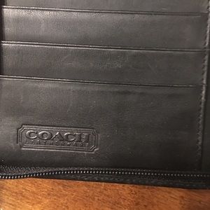 Coach leather refillable planner.