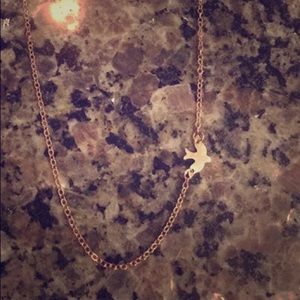 Gold colored sparrow necklace